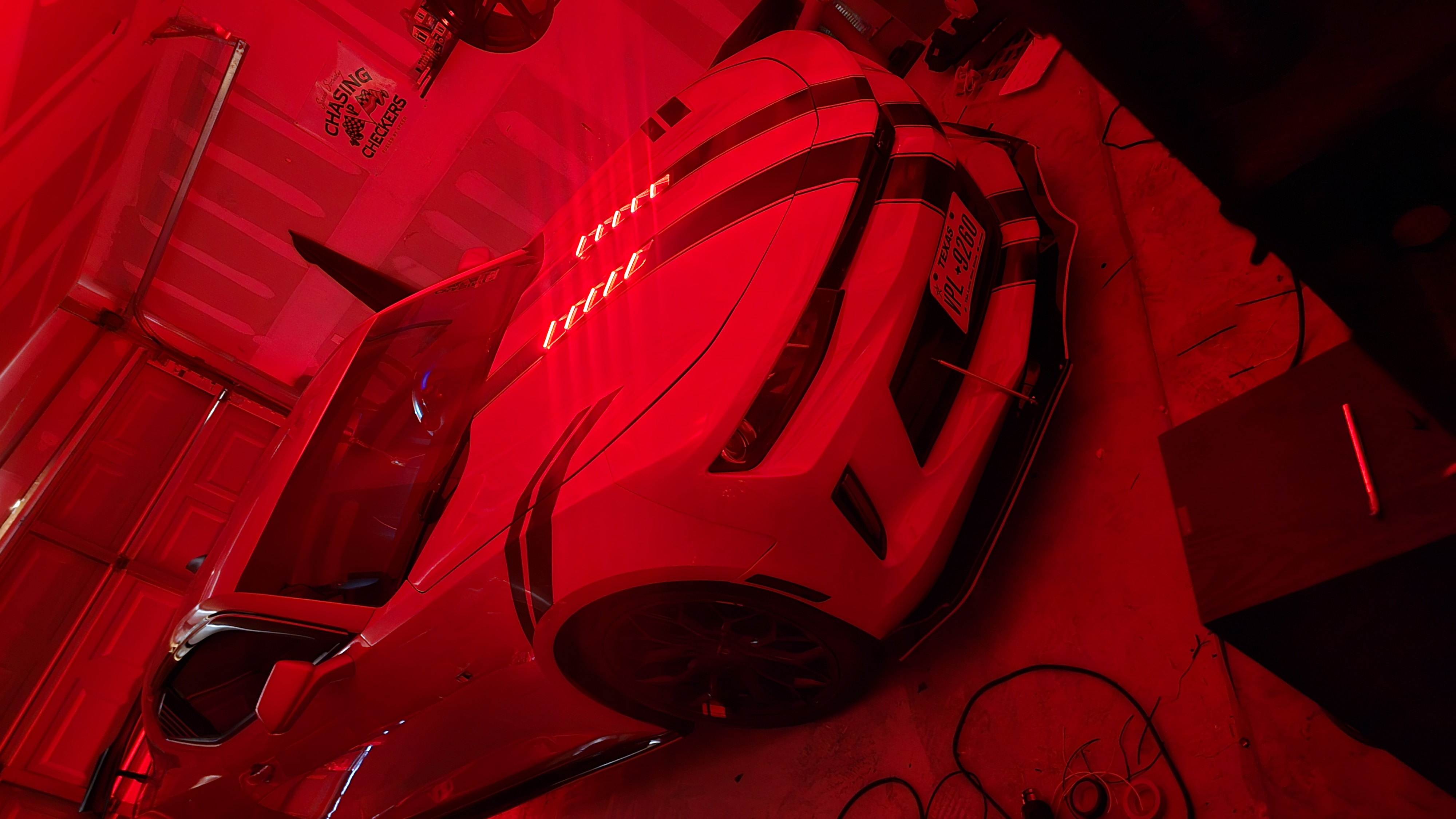 Custom LED lighting installed on the hood vents of a Chevrolet Camaro.